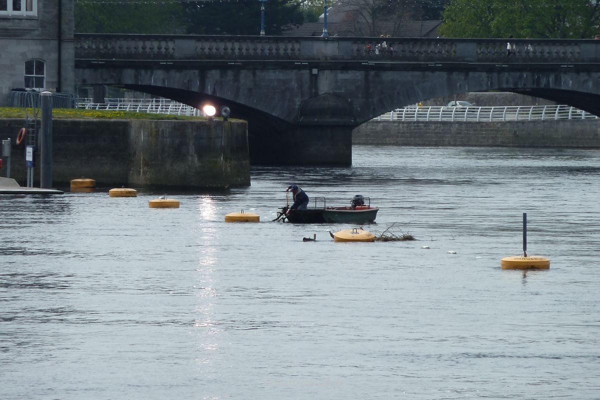 Pat clearing the weir