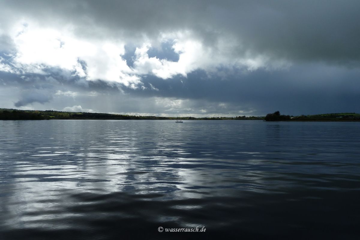 Dark clouds over the lake