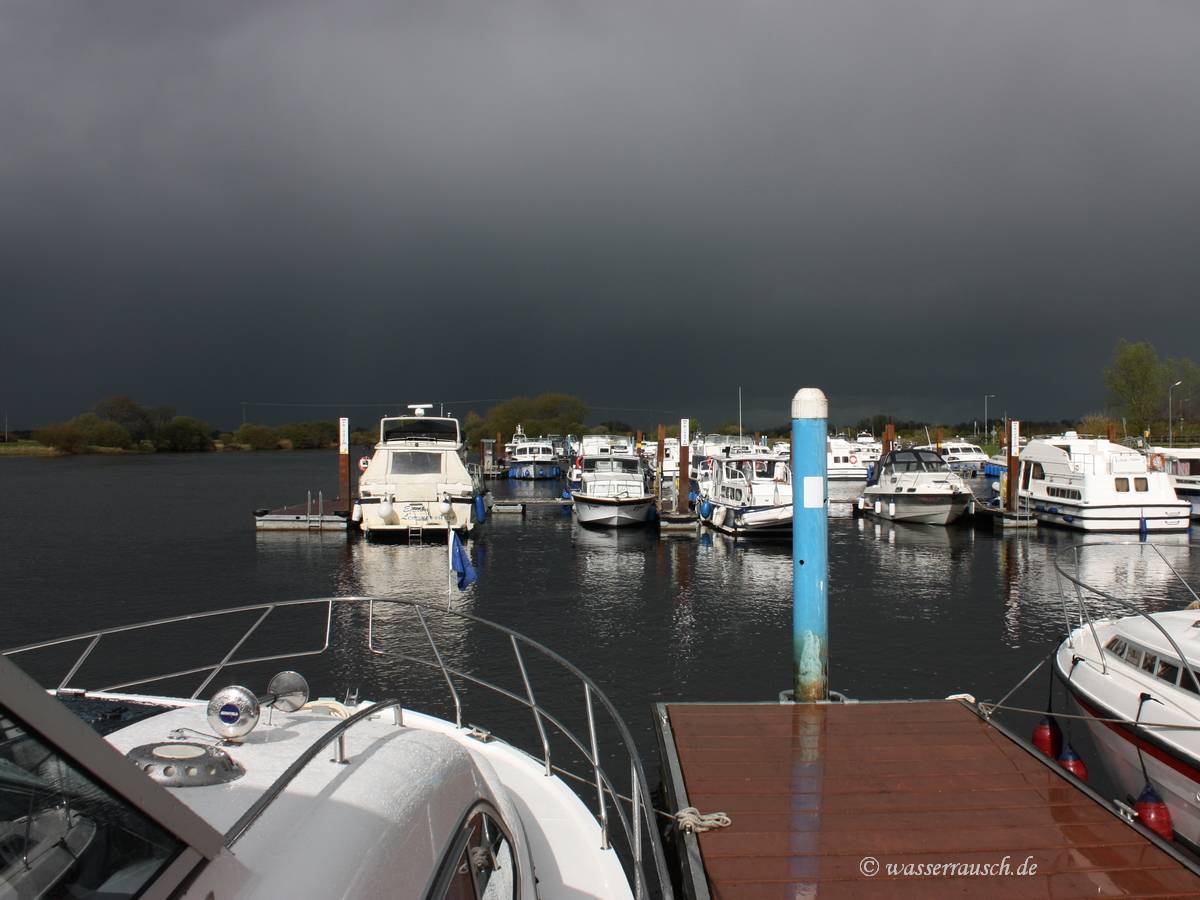 Banagher jetties with dark sky in the background