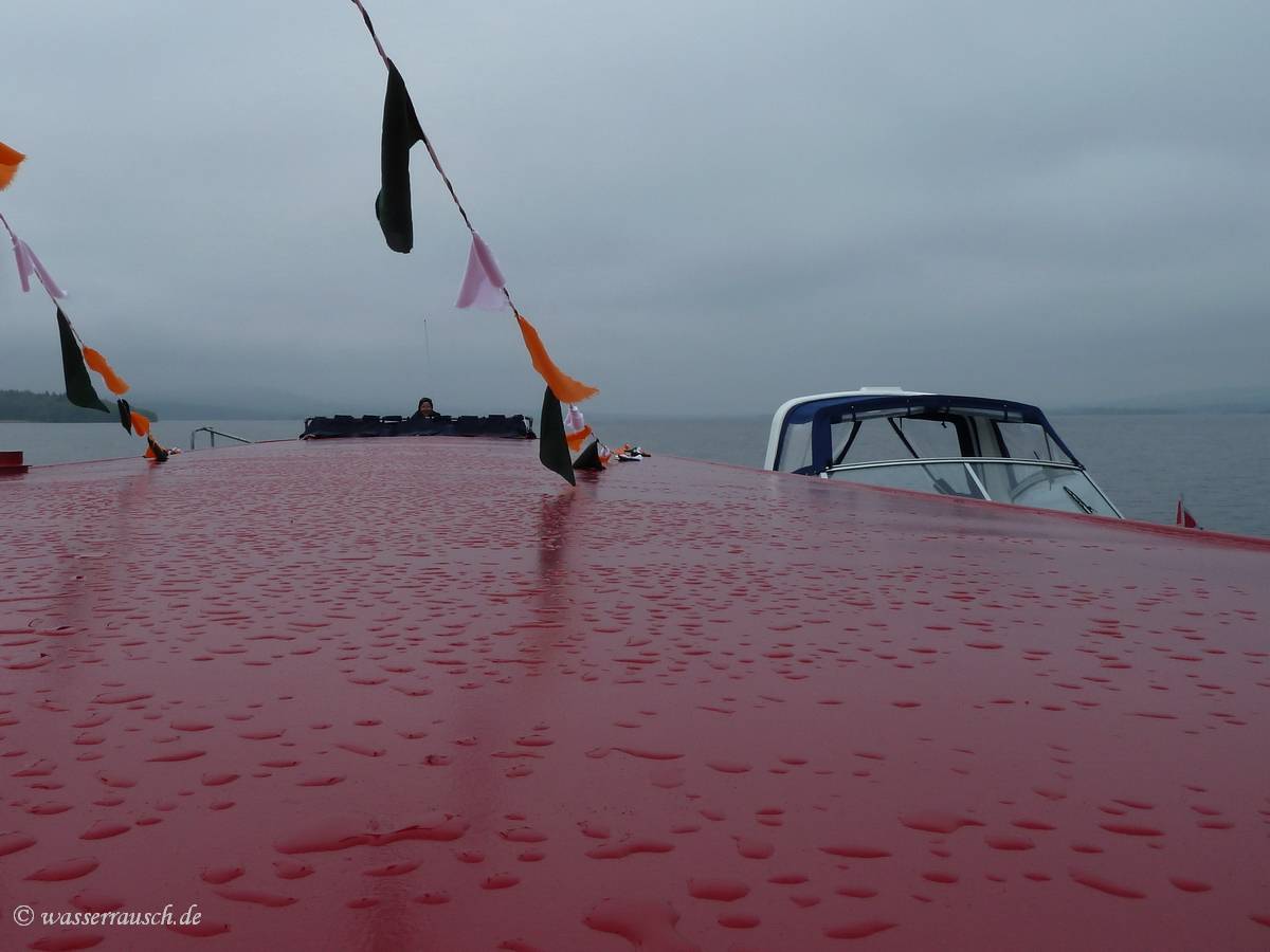 Which boat is longer?