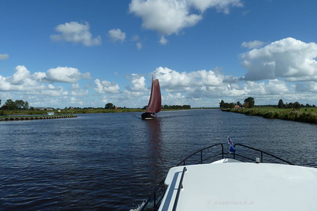 Sailing boat on the canal