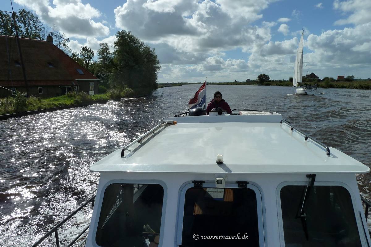 Sailing boat on the canal